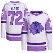 Adidas Alex Vlasic Chicago Blackhawks Men's Authentic Hockey Fights Cancer Primegreen Jersey - White/Purple