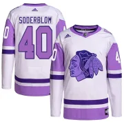 Adidas Arvid Soderblom Chicago Blackhawks Men's Authentic Hockey Fights Cancer Primegreen Jersey - White/Purple
