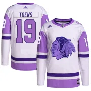 Adidas Jonathan Toews Chicago Blackhawks Men's Authentic Hockey Fights Cancer Primegreen Jersey - White/Purple