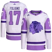 Adidas Nick Foligno Chicago Blackhawks Men's Authentic Hockey Fights Cancer Primegreen Jersey - White/Purple