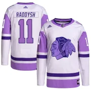 Adidas Taylor Raddysh Chicago Blackhawks Men's Authentic Hockey Fights Cancer Primegreen Jersey - White/Purple